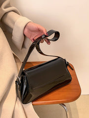 glossy black leather purse