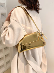 glossy gold leather purse